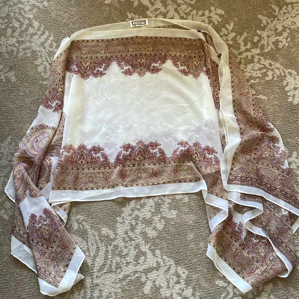 Women’s Poly kimono/cape/poncho top, paisley printed, button on the shoulder.